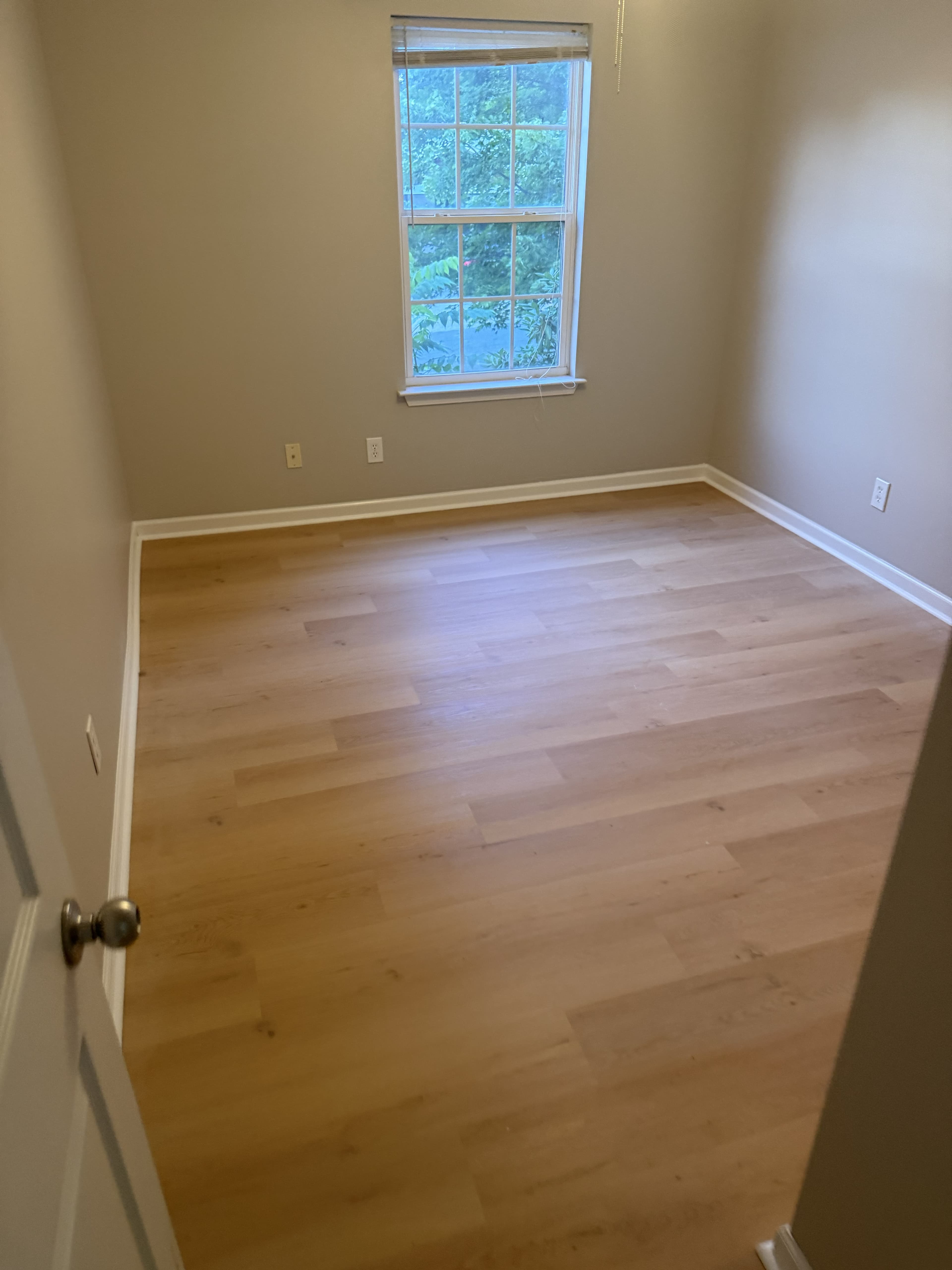 LVP Flooring Installation & Full Interior Painting – Image 1